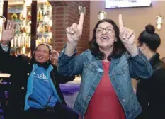  ?? — Reuters ?? Democratic congressio­nal candidate Rashida Tlaib celebrates with family and friends in Detroit.