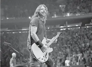  ?? GETTY ?? Dave Grohl performs onstage as the Foo Fighters reopen Madison Square Garden on June 20 in New York City. The Foo Fighters are scheduled to perform Lollapaloo­za on Sunday.