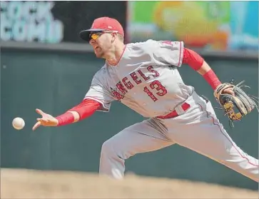  ?? Anthony Souffle TNS ?? THE ANGELS’ Nick Franklin, shown in action during a July 4 game against Minnesota, was the 27th pick in the 2009 draft, two spots behind Mike Trout. His major league career didn’t take off like Trout’s, however.