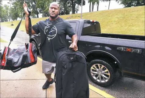  ?? Peter Diana/Post-Gazette photos ?? Linebacker James Harrison reports for the start of training camp Thursday at Saint Vincent College in Latrobe.