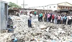  ?? ?? Garbage piles up in a neighbourh­ood affected by the cholera outbreak in Lusaka, Zambia