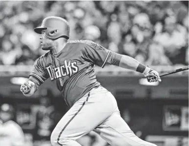  ?? JAKE ROTH, USA TODAY SPORTS ?? The Diamondbac­ks’ Yasmany Tomas grounds out in his first major league at-bat Wednesday.