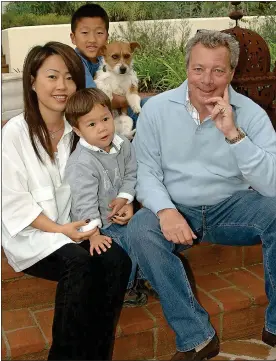  ??  ?? TOGETHER: Susan Kim with Victor Chandler and sons Jamie and Billy in 2007