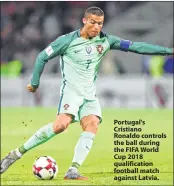  ??  ?? Portugal's Cristiano Ronaldo controls the ball during the FIFA World Cup 2018 qualificat­ion football match against Latvia.