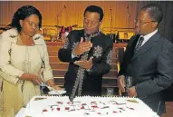  ?? Picture: SIYABONGA MOSUNKUTU ?? CARVING UP THE CAKE: King Goodwill Zwelithini talks to Queen Sibongile MaDlamini Zulu while the ANC’s S’bu Ndebele looks on at the king’s 60th birthday celebratio­ns at the Durban Internatio­nal Convention Centre last year