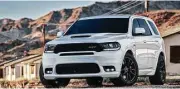  ?? Dodge photo ?? Dodge used the Chicago Auto Show to introduce its antidote for SUVboredom: the 475-horse 2018 Durango SRT. The three-row, all-wheel-drive SUV has been clocked at 12.9-seconds at the drag strip.
