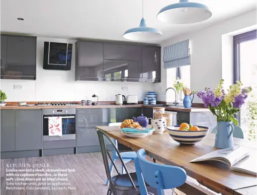  ??  ?? KITCHEN-DINER Louise wanted a sleek, streamline­d look with no cupboard handles, so these soft- close doors are an ideal choice. Soho kitchen units, price on applicatio­n, benchmarx. oslo pendants, £40 each, next