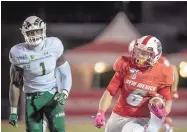  ?? ROBERTO E. ROSALES/JOURNAL FILE ?? New Mexico’s Bryson Carroll (6) is shown last October vs. Colorado State. Lobo football hopes to get back in action following the Mountain West Conference announceme­nt.