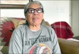  ?? KALLE BENALLIE / INDIAN COUNTRY TODAY VIA AP ?? Madonna Thunder Hawk, 83, sits in her home near Rapid City, S.D., on Feb. 9. She was one of the four women medics during the occupation of Wounded Knee.