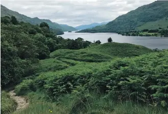  ?? LYNN DOMBEK, THE ASSOCIATED PRESS ?? Terrain on West Highland Way runs the gamut from pastoral landscapes to rugged moors and highlands. This photo was taken at Loch Lomond.