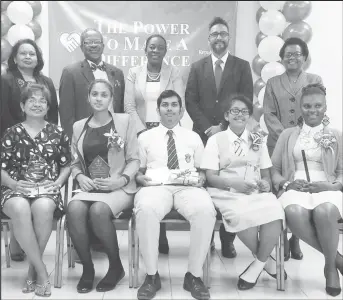  ??  ?? Seated from left are a representa­tive for CAPE Awardee Shannon Woodroffe, Shania Anirood, Michael Bhopaul, Saskia Twahir and a representa­tive for Elsie Harry.