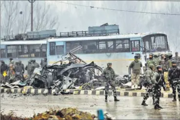  ?? WASEEM ANDRABI/ HT PHOTO ?? At least 44 CRPF personnel are feared dead after a Jaish suicide bomber rammed a vehicle carrying over 100 kg of explosives into their bus in Pulwama district on Thursday.