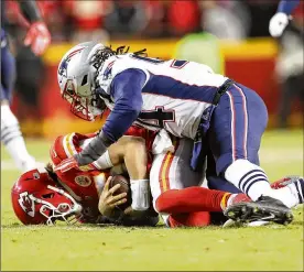  ?? PATRICK SMITH / GETTY IMAGES ?? Former Falcon Adrian Clayborn, tackling Patrick Mahomes of the Chiefs in last season’s AFC Championsh­ip game, has been released by the Patriots.