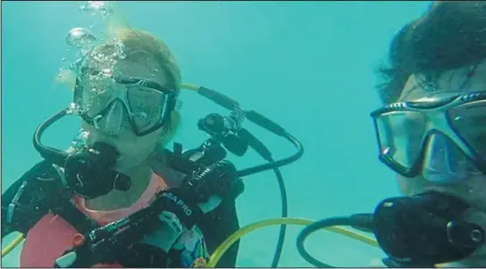  ??  ?? ‘Hardship’: A photograph of Dominic Chappell, right, scuba diving in the Bahamas last Christmas, which he posted on social media