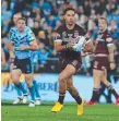  ?? Picture: ADAM HEAD ?? Corey Norman gets the Maroons moving.