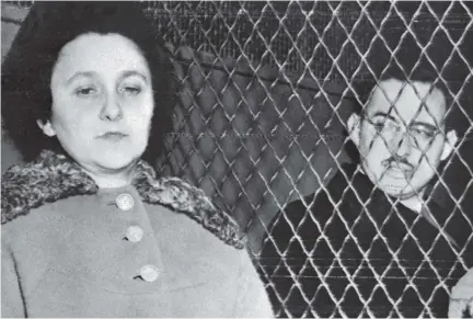  ?? AFP/ GETTY IMAGES FILES ?? Ethel and Julius Rosenberg ride in a police van in New York shortly before their execution in June 1953. They were found guilty, in a highly controvers­ial trial, of passing atomic secrets to the Soviet Union and were the first U.S. civilians to be...