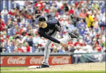  ?? MATT SLOCUM / ASSOCIATED PRESS ?? Starting pitcher Mike Foltynewic­z limited the Phillies to a single over six innings while striking out nine batters and gave up one run in the seventh.