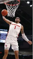  ?? GARY LANDERS — THE ASSOCIATED PRESS ?? Obi Toppin’s 10-for-11 shooting night helped the Flyers shoot nearly 73% from the field in a big win over Davidson.