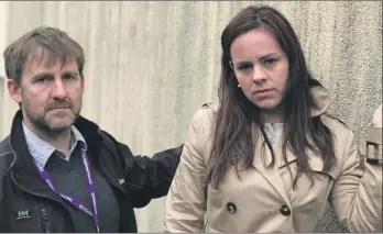  ??  ?? Lochaber MSP Kate Forbes joined local councillor Niall McLean to inspect the problem cladding in Plantation, Foprt William, last week.