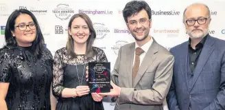  ??  ?? Mahsa Chadry, James Adie and Hope Drew from Colonel Duck, winner of PropTech Business of the Year, with Marc Reeves from sponsor BusinessLi­ve