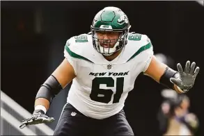  ?? Winslow Townson / Associated Press ?? New York Jets offensive tackle Max Mitchell looks to block against the Pittsburgh Steelers during a game at Acrisure Stadium on Oct. 2 in Pittsburgh. Mitchell was placed on the non-football injury list and he’ll miss the rest of the season.