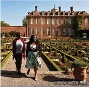  ?? ?? RIGHT: Visitors explore the parterre garden at Hanbury Hall and
Gardens, Worcesters­hire ©National Trust/john Millar