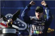  ?? MATT SLOCUM — THE ASSOCIATED PRESS ?? Kyle Busch celebrates after winning the Monster Energy Cup race July 30 at Pocono Raceway.