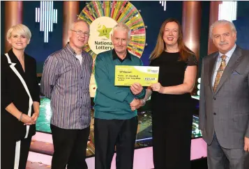  ??  ?? Winning Streak hosts Sinead Kennedy (left) and Marty Whelan (right) with Robert Nolan, National Lottery ticket selling agent from the Post Office in Newtownmou­ntkennedy, winning player John McDonald and Jenny Fisher from the National Lottery.