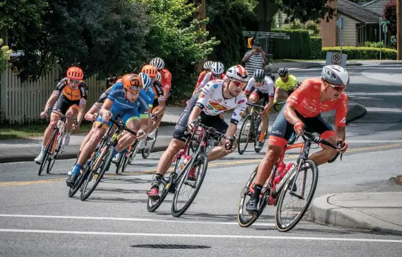  ??  ?? opposite Burke races the 2016 B.C. time trial championsh­ipsabove Burke rides in his Jelly Belly kit at the Tour de Delta road race, part of BC Superweek in 2018