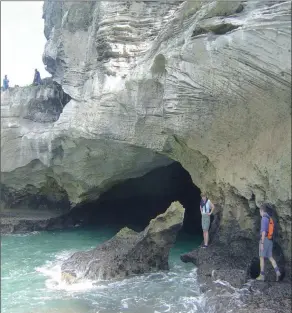  ??  ?? BREATHTAKI­NG: The cave that lurks below the cliffs.