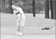  ?? NWA Democrat-Gazette/BEN GOFF • @NWABENGOFF ?? Matt Willmott putts on the 18th green Saturday during the second round of the Chick-A-Tee golf tournament at Springdale Country Club.