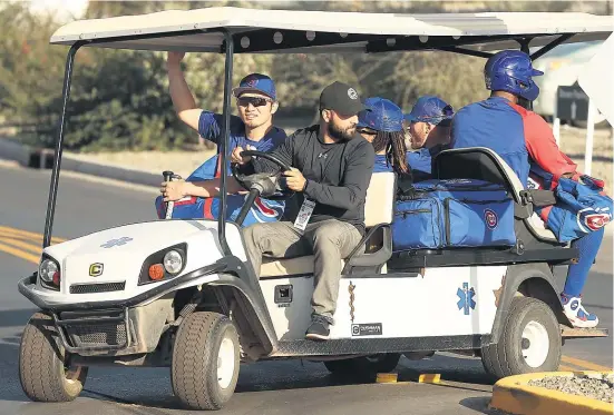  ?? JOHN ANTONOFF/SUN-TIMES ?? Jed Hoyer believes Seiya Suzuki, riding back to the clubhouse with his new Cubs teammates, will flourish once he gets used to MLB pitching.