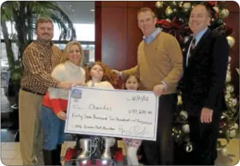  ??  ?? Above are Michael, Jodi, Caroline and Jillian Lanctot of Caroline’s Hope, one of beneficiar­ies of the event; Brian Barry, the event director of the Trenton Half Marathon; and Scott Haldeman, president of Haldeman Family of Dealers.