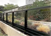  ??  ?? And this is the new top fence, which allows a view through to the grasses planted on the upper terrace.