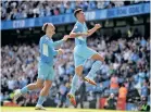  ??  ?? Manchester City midfielder Rodri (right) celebrates his goal against Arsenal