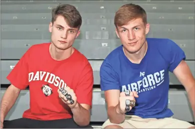  ?? Jeremy Stewart ?? Rome News-Tribune 2019 Wrestlers of the Year Dalton Blankenshi­p (left) and Colton Woods leave a legacy at Darlington after winning four straight GHSA traditiona­l state championsh­ips spanning their entire high school careers.