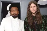  ?? EVAN AGOSTINI/INVISION/AP ?? Ludwig Goransson (right) with collaborat­or Donald “Childish Gambino” Glover at the Grammy Awards last January.