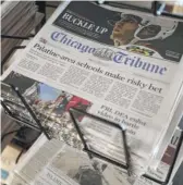  ?? KIICHIRO SATO/AP FILE ?? Alden Global Capital already owns 32% of Tribune Publishing, the parent company of the Chicago Tribune. Alden is trying to buy the rest of the company but faces a competing offer.