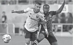  ?? KYLE ROBERTSON/COLUMBUS DISPATCH ?? Crew midfielder Kevin Molino, right, will end this season with one goal, zero assists, and a mere two shots on target.