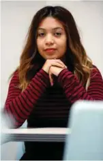  ??  ?? CHICAGO: Andrea Aguilera sits at the Erie Neighborho­od House on Thursday.—AP