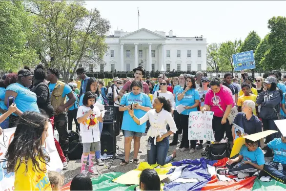  ?? KATHERINE FREY/WASHINGTON POST. ?? Heather Piña, now 9, speaks out against President Donald Trump’s immigratio­n policies at a rally in April. Her parents are undocument­ed.