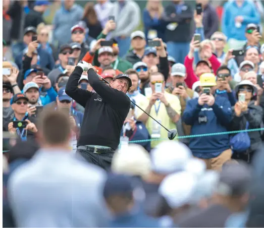  ??  ?? Rolex Testimonee and recent major winner Phil Mickelson tees off at the U.S. Open.