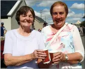  ??  ?? Mary Harman and Maureen Ryle were among the many people enjoying the fun and sunshine at the Spa Fenit Community Council heritage day in Churchill.