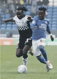  ??  ?? Siriki Dembele in action for Posh against Coventry