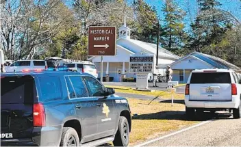  ?? ZAK WELLERMAN AP ?? The Smith County Sheriff 's Office investigat­es a fatal shooting incident at the Star ville Methodist Church in Winona, Texas, on Sunday morning. A suspect who f led has been arrested, said the sheriff 's office.