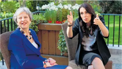  ?? Photo / Getty Images ?? British Prime Minister Theresa May speaks with Jacinda Ardern in the gardens at Downing St in April last year. They meet again next week.