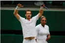  ??  ?? Andy Murray makes himself big as his partner looks slightly bemused. Photograph: Tom Jenkins/The Guardian