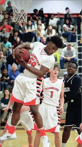  ??  ?? LaFayette’s Dee Southern pulls down a rebound during the Ramblers’ clash with Ridgeland this past Friday night. LaFayette opened this week a half-game up on Heritage for second place in 6-AAAA. (Messenger photo/Scott Herpst)