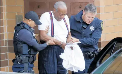  ?? Photo / AP ?? Bill Cosby was led away in handcuffs after being sentenced to three to 10 years in prison.