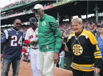  ?? MADDIE MEYER/GETTY IMAGES FILES ?? Two of sport’s all-time greats were on Boston teams — Celtics player Bill Russell and Bobby Orr of the Bruins — and their legacies live on in a city where winning is a habit, whether it be the Celtics, Bruins, Red Sox or New England Patriots.